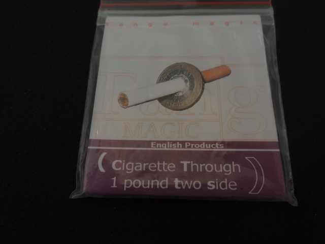 Cigarette Note or Other Object Through 1 Pound Coin